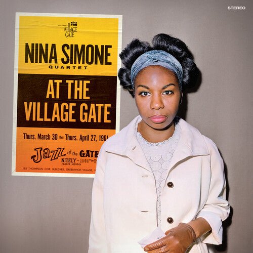 AT THE VILLAGE GATE