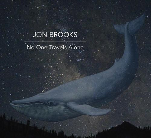 NO ONE TRAVELS ALONE